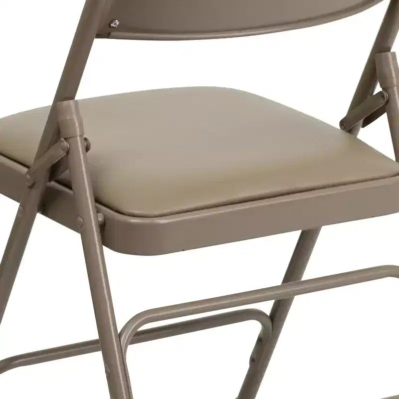Chaise pliante en métal rembourrée série HERCULES à triple renfort et double charnière