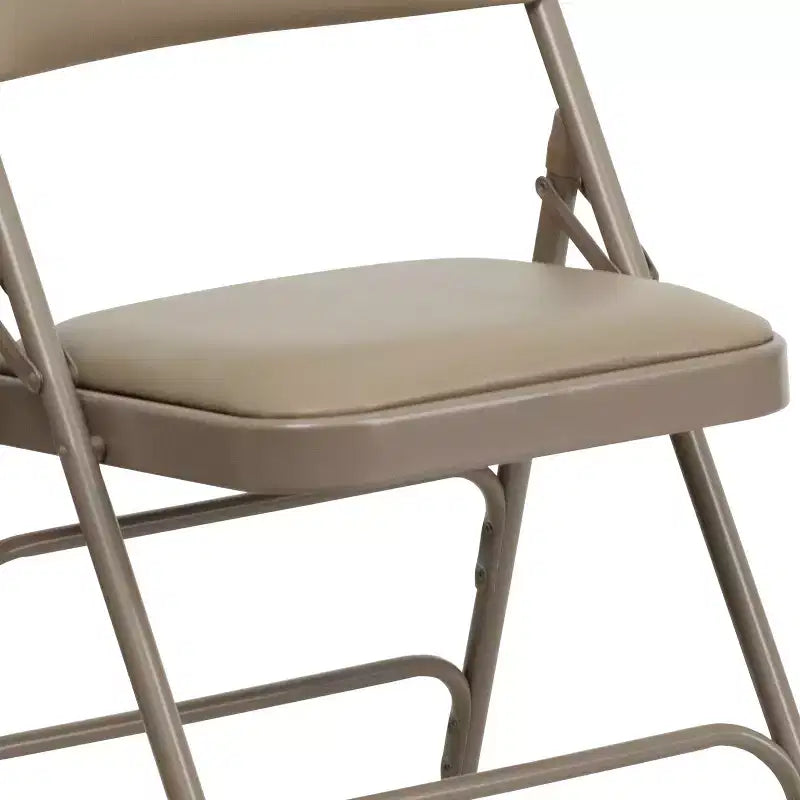 Chaise pliante en métal rembourrée série HERCULES à triple renfort et double charnière