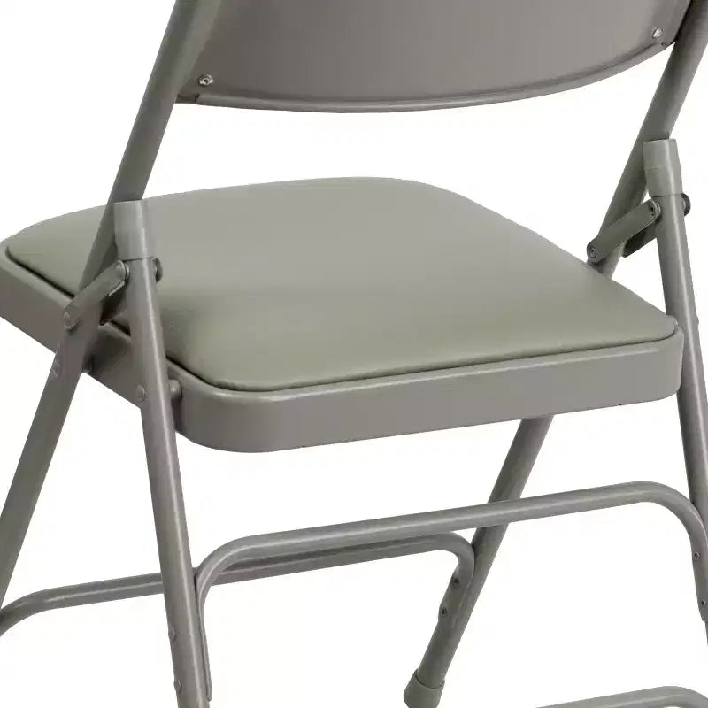 Chaise pliante en métal rembourrée série HERCULES à triple renfort et double charnière