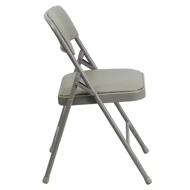 Chaise pliante en métal rembourrée série HERCULES à triple renfort et double charnière